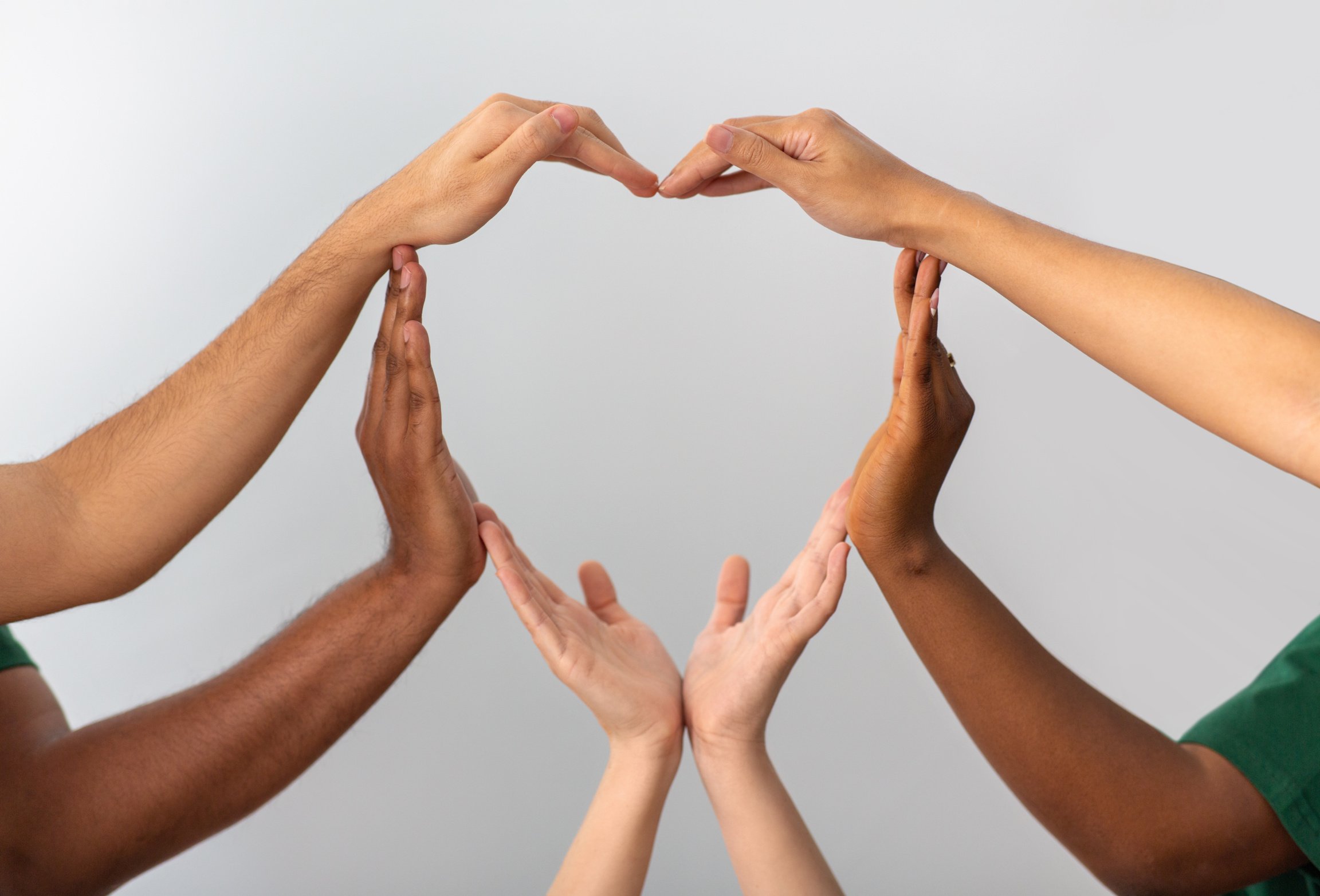 Close up of Hands Making Heart Gesture